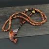 H￤nge halsband handgjorda vintage talisman etniska nepal halsband buddhist mala tr￤ p￤rlor fisk l￥ng uttalande tr￶ja