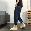 Jeans pour hommes Américain Tendance Neuf Points Loose Street Washed Denim Salopette avec petits pieds Vieux Sarouel Pantalon élastique Motorwear