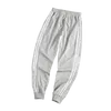 Męskie spodnie męskie / Kobiety Joggers Casual Casual Drawstring Wygodne fitness sportowe spodnie dresowe Streetwear Dress Spodnie