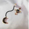 Version coréenne des nouvelles étoiles Moon Sangle Boucles d'oreilles Femme Femme Spot de bijoux de boucle d'oreille asymétrique Feme