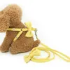 犬のハーネスリーシュカラーセット調節可能な柔らかいかわいい弓二重層犬のハーネスのための犬ハーネス屋外ウォーキング210712