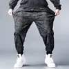 Plus storlek 5xl streetwear lösa byxor män joggare 2020 man avslappnad camo hip hop harem byxor män kamouflage balk fötter sweatpants x0723