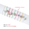 9 stks / set Kerst Sneeuwvlok Bell Armbanden voor Vrouwen Meisje Kleurrijke Wax Touw Verstelbare Bangles Legering Armband Set Sieraden Gift