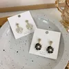 Boucles d'oreilles camélia romantiques en perles, bijoux de bal de mariage, fleur noire et blanche percée, accessoires Vintage pour femmes