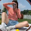女性の夏の長袖の日焼け止めカーディガンリブニットフリュームセータークロップボタンダウンソリッドカラーVネックアウトウェア210914