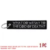 Keychains WHAT DO WE SAY TO THE GOD OF DEATH Keychain For Motorcycles And Cars Embroidery OEM Key Chain Keyring Tags Fashion Llaveros