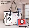 Luxurys Totes Designers Leatra Letra l Bola de Totes femininas Bolsa de ombro cruzado Bolsa de ombro cosmético bolso do telefone celular NO40156B-2