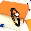 Armband mode New Men039S Women039S Leather Armband Luxury Classic Cross Color Pärlor Handrep Japan Sydkorea Lo6982507