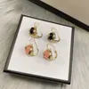 Pendientes chapados en oro de 18 k Moda para mujer Pendientes de diseño retro de tendencia Pendientes de diamantes de calidad superior Suministro de joyería