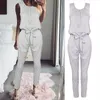 Kvinnors Jumpsuits Rompar Kvinnor Ärmlös Jumpsuit Casual Loose Byxor Modig Sommar Svart Combinaison Långben Byxor Bodysuit Wit