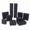 black cardboard boxes