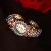Muñecos de pulsera Damas de lujo Diamond Quartz Watches Vestido de mujeres Mira Vintage Flower Patrón de pulsera Moda de pulsera Femenina Femenina