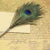 学生の誕生日パーティーの羽毛のボールポイントクイルカラーインクペンの文房具孔雀の羽の形のペンが個性のためのペンT9i001235