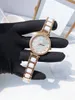 Fashion Mor of Pearl Dial Design Vit Keramisk Rem Klocka för Kvinnor Kvarts Klocka Silver Rostfritt Stål Keramik Armbandsur 33mm