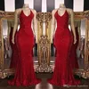 Nya glittrande röda paljetter Prom Dresses Halter Mermaid Long Prom -klänningar Lågrygg Arabisk festklänning BC1085
