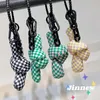 Chaveiros Criativo Communer Torcido Keychain Keychain Feminino Feminino Bonito Anel Handmade Anel Ornament Bag Tela Pingente Knot Key