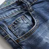 2022 Jeans rasgados dos homens da primavera Outono moda fina slim-fir stroet calças de denim hip hop costura casual stitchwear
