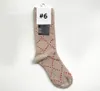 Designer sokken luxe Heren Dames katoenen Sok Klassieke GU Letter Comfortabele Hoge kwaliteit Mode Flash Bewegingskous