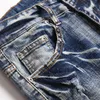 Indygo niebieskie poszarpane łatki męskie dżinsy moda Slim Fit sprane motocyklowe spodnie dżinsowe panele hip-hopowe spodnie ze streczem