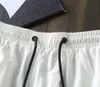 2021 diseñadores para mujer para mujer pantalones cortos de verano Moda de verano Una ropa de calle Ropa de secado rápido Traje de baño Tablero de impresión Pantalones de playa M-3XL # 44