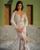 Arabski Aso Ebi 2021 Luksusowe koronkowe suknie ślubne z koralikami Sheer Szyja Długie rękawy Vintage Seksowne sukienki dla nowożeńców ZJ366