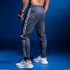 Pantalones de jogging para hombres GYM Ropa deportiva Pantalones deportivos Pantalones deportivos para correr para hombres Pantalones deportivos para correr con bolsillos 4
