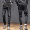 Mäns andningsbara högkvalitativa modebyxor Varma män Solida Jeans Straight Print Mid Midistknapp Byxor 210716