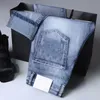 Męskie dżinsy Wysokiej jakości projektant rozerwany dżinsy Hip Hop Rock Revival Jean w trudnej sytuacji motocyklowy motocykl luksusowy dżins dla męskich mody Pants