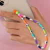 2021 lanière de sangle Mobile coloré sourire perle douce poterie corde étui de téléphone portable cordon suspendu pour les femmes