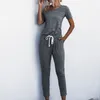 Vår sommar bodysuit kvinnor streetwear casual off-axel kortärmad ficka spets-up svart kvinnor strapless jumpsuit 210514