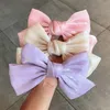 Hårtillbehör Klassisk stil Pearl Satin Multicolor Bow Spring Clip Ponytail Kvinnors hårnål