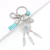 البيع بالجملة الجديدة Aqua Tassel Dreamcatcher Keychain Carn Hanging Key Vintage Enchanted Forest Dream Catcher Net مع زخرفة تزيين يدوية للريش للمرأة الهدايا