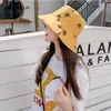 女の子の春と夏の漁師帽子韓国語バージョン汎用サンシェード旅行グラフィティレッドリップレターキャップバケツビーチワイドブリム帽子