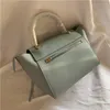 2021 luxury designer Catfish bags Good quality handbag brand fashion women's handbags 24cm Classic Leather Flip bag