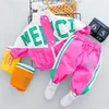 Tuta per bambini Ragazzo Ragazza Abbigliamento Set Casual Manica lunga Lettera Cerniera Oufit Abbigliamento infantile Pantaloni per bambini 1 2 3 4 anni 211021