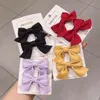 Accessoires de cheveux 2 pièces/ensemble coréen doux couleur unie arcs pince pour enfants filles Boutique à la main épingles à cheveux chapeaux Barrettes