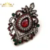 Turecki Vintage Micro Pave Crystal Otwiera filigran Scroll Dark Red Brooch Teardrop Stone Coped Oval Shaped Pin Hidżab Biżuteria