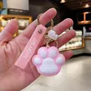 Porte-clés chat patte de chat clé de voiture personnalité en silicone créatif couple pendentif joli sac