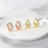 Boucles d'oreilles en zircon en diamant en acier titane plaqué or