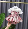 Pré-vente d'été filles princesse vêtements ensembles enfants tenues à carreaux enfants dentelle noeud papillon chemise + jupes à bretelles à carreaux 2 pièces vêtements costumes S1050