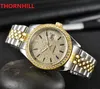 Fashion Full Diamonds Dial Ring Men Women Watch 40mm الفولاذ المقاوم للصدأ أعلى جودة عشاق الساعات رجل الكوارتز الفاخرة الأعمال الكلاسيكية على مدار الساعة