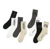 NOUVELLEZ SOCKS MENS ET FEMMES SOCKES DE LETTRE MENS