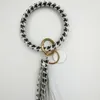 Cross-border fashion trend bracelet pu leather disc drip oil tassel pendant keychain