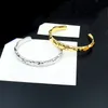 Europa amerika mode stijl mannen dame vrouwen titanium staal 18 k goud gegraveerde brief bloem open gesneden armband m00332