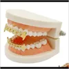 Грильц, стоматологические ювелирные украшения доставки 2021 Полная подгонка полная кубинская клыка с коляскими хип-хоп зубы