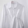 Massief witte revers kraag single breasted asymmetrisch stiksel golvend shirt zwarte taille jas pak lente gx627 210421