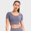 L-037 Yoga klänning Kvinnor Topps Sexig Naken Kors Back Exposed Navel Paddlad Bra Kortärmad T-shirt Slim Stretch Sport Fitness Underkläder Gym