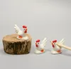 100 sztuk Super Cute Cocks Kształt Ceramiczne Chopsticks Posiadacze Obiadowa Design Dekoracja Rękodzieła Ozdoby Ozdoby Pen Sn3091