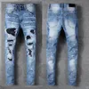 Herenontwerpers Jeans van noodslachtige scheurde slanke rechte denim voor heren print dames leger mode mans skinny broek