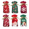 Cadeau cadeau 10pcs / pack Santa Pattern Année présente des sacs de bonbons Décoration de Noël Sac à cordon en plastique S / M / L